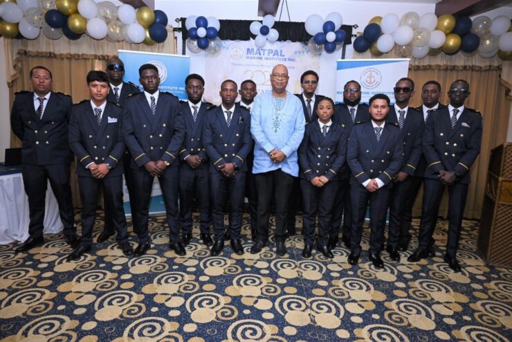 Minister of Public Works Bishop Juan Edghill flanked by the Marine Cadet Programme graduates [MATPAL photo]